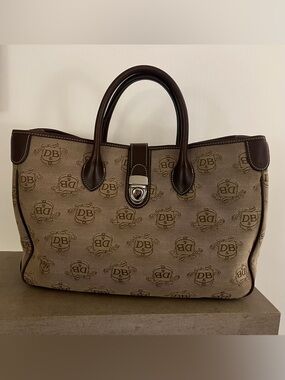 Dooney & Bourke Vintage Signature Donegal Crest Tan Canvas Leather Satchel Bag